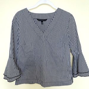 White House Black Market: Black & white checkered blouse with puff sleeves!